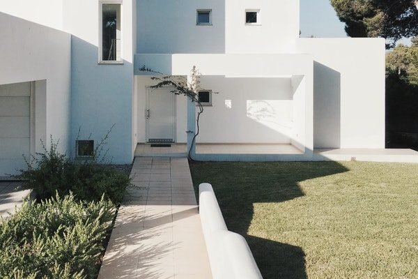 white-2-storey-house-near-trees-1115804